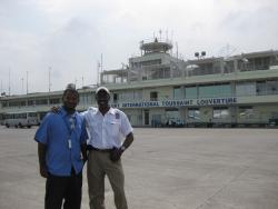 Pilot George Miller and co-pilot Henley Joseph at the Haiti airport.